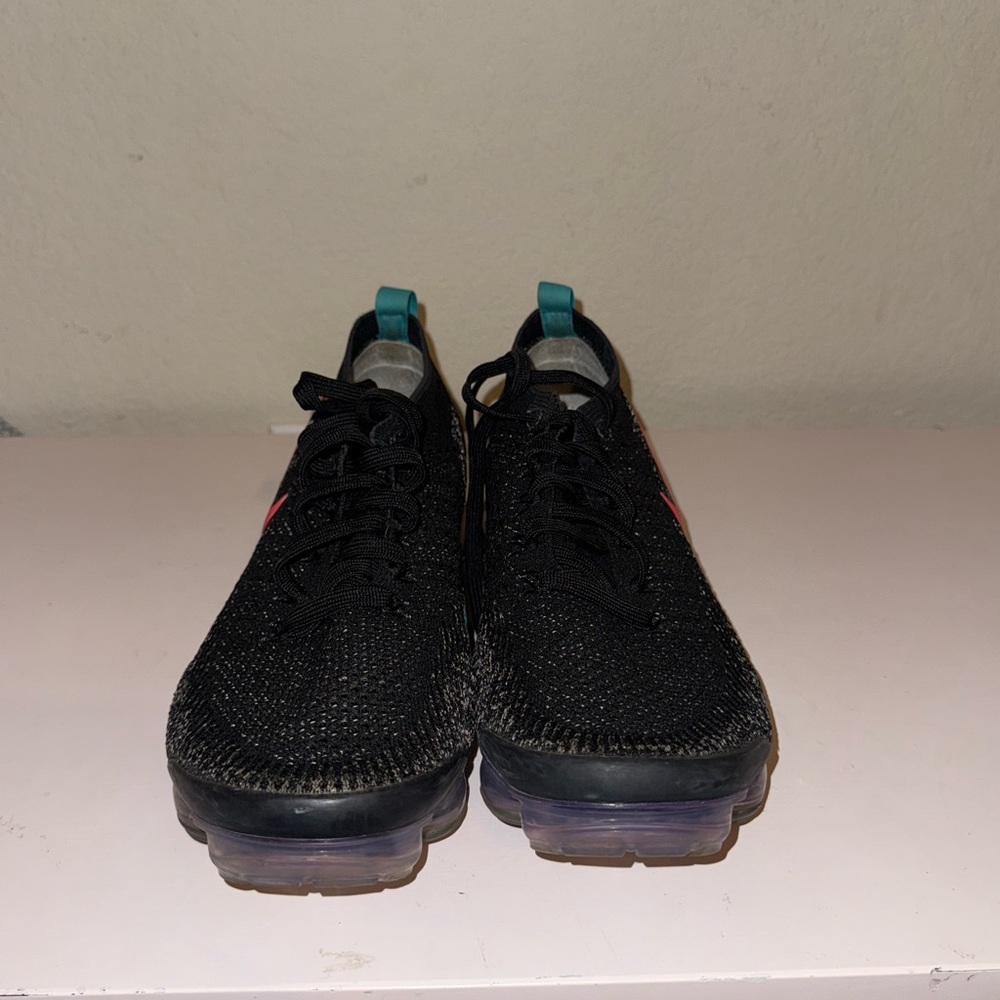 Nike Black Athletic Shoes with Teal Accents